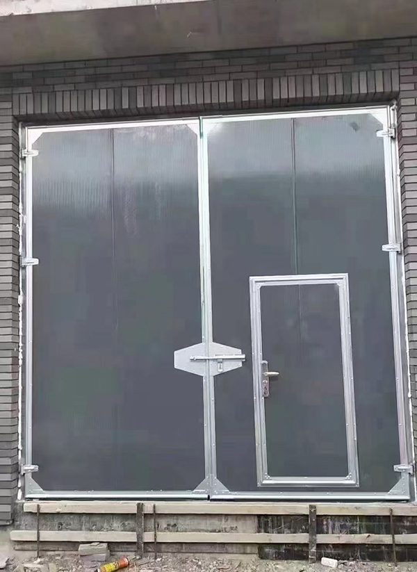 定边工业平开门在大型设备制造车间的应用实例